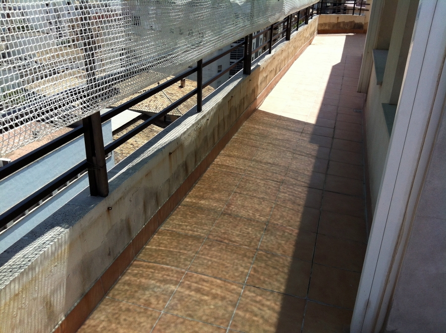REHABILITACION DE TERRAZA CON MATERIAL IMPERMEABLE TRANSPARENTE Y TRANSITABLE