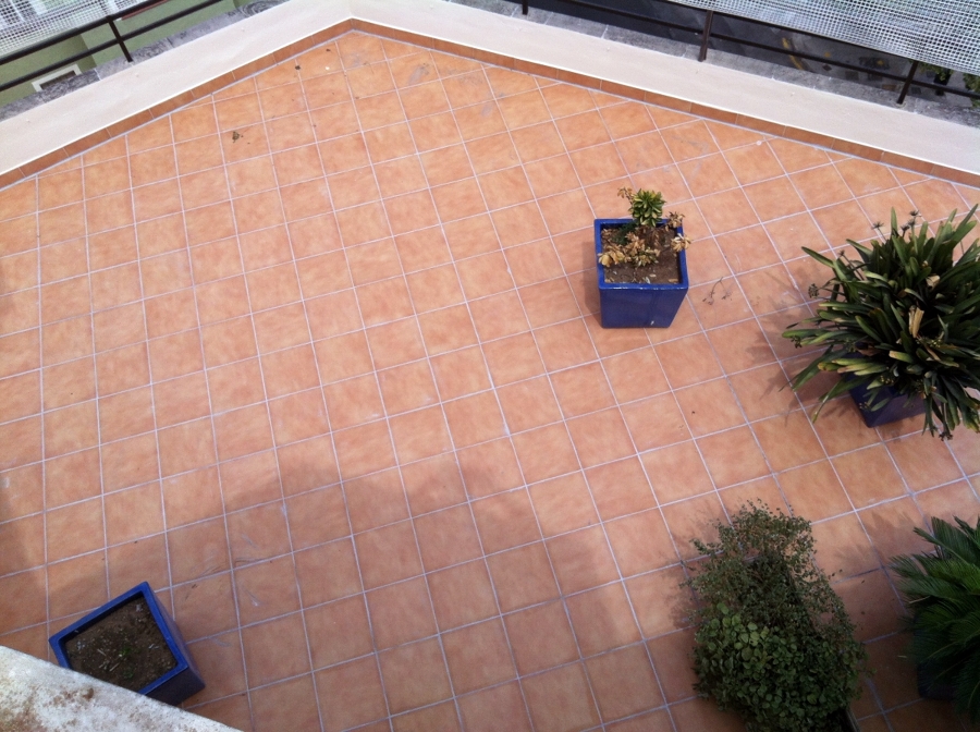 REHABILITACION DE TERRAZA CON MATERIAL IMPERMEABLE TRANSPARENTE Y TRANSITABLE