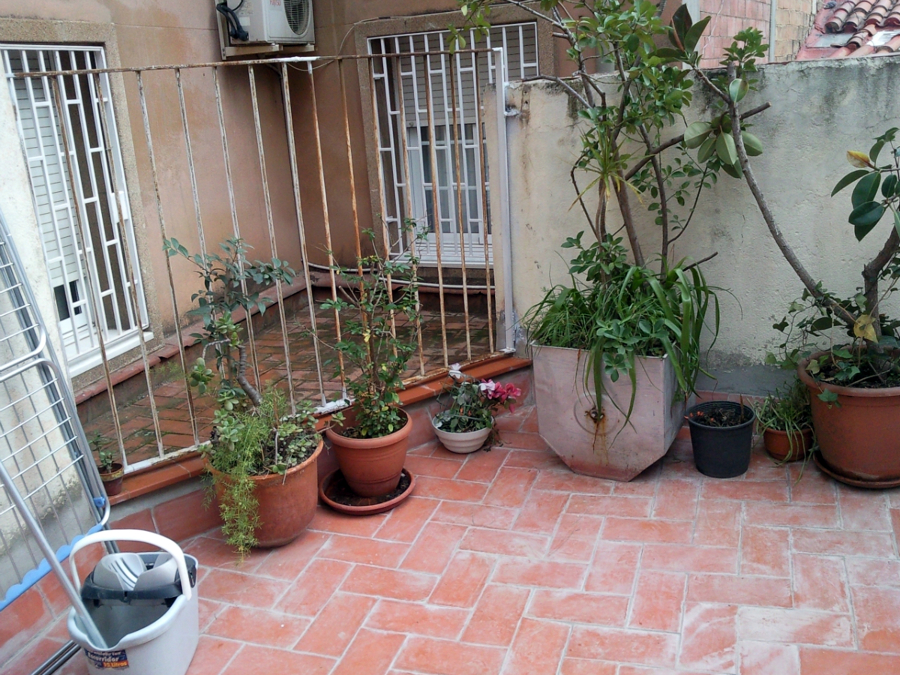 Rehabilitación de terrazas en pisos primero, fachada posterior de edificio plurifamiliar.