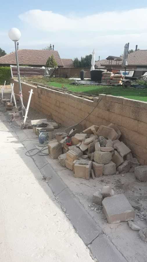 Rehacer muro caido