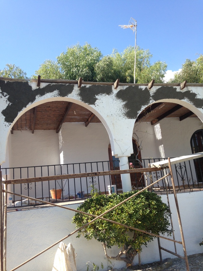 Renovación de fachada y aplicación de mortero rústico