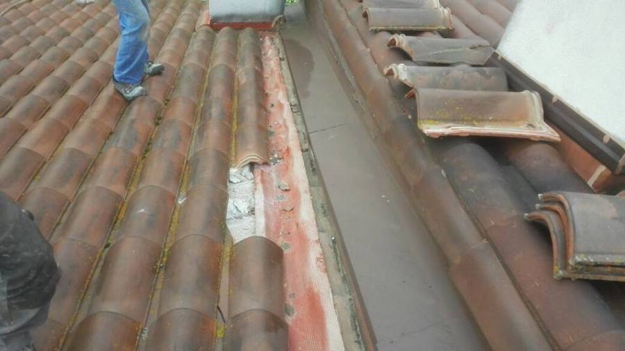 Reparación gotera en chimenea