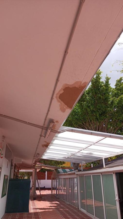 Reparación y pintura exterior centro comercial Tafira