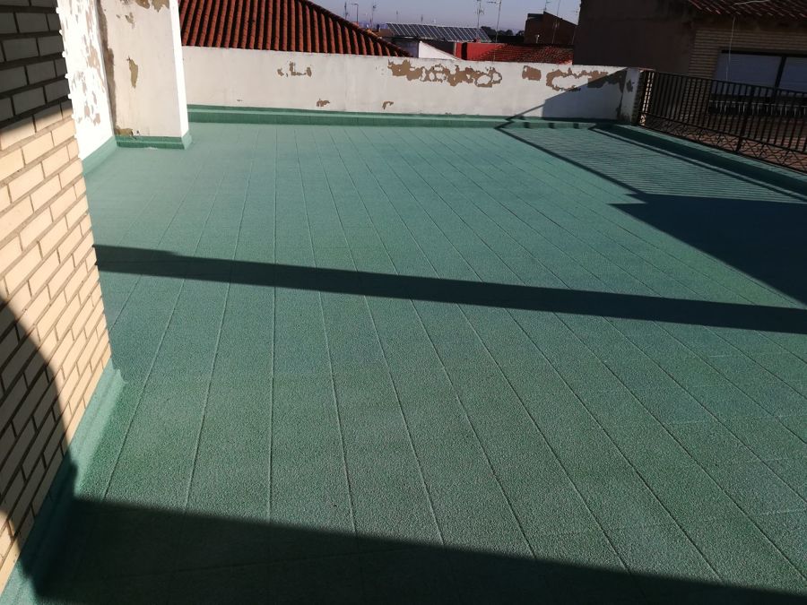 Revestimiento de terraza con cuarzo proyectado