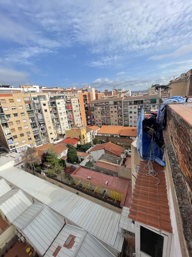 Revoque mortero local 36 m² con sistemas de posicionamiento con cuerda en altura y trabajos