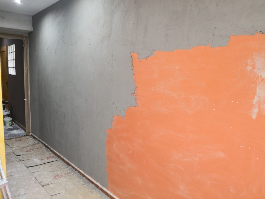 Revoque sobre pared pintada