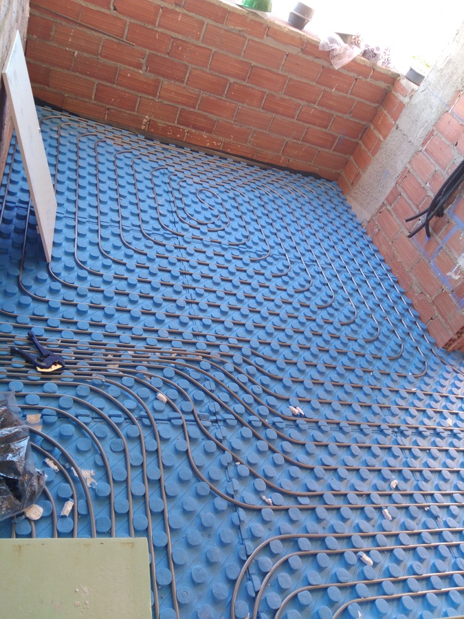 Salida de colector de suelo radiante.