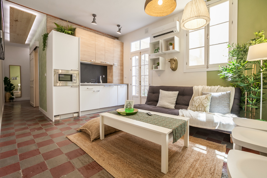 Salón con cocina abierta