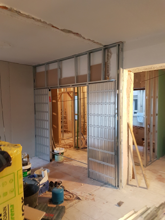 Salón con puerta Corredera doble