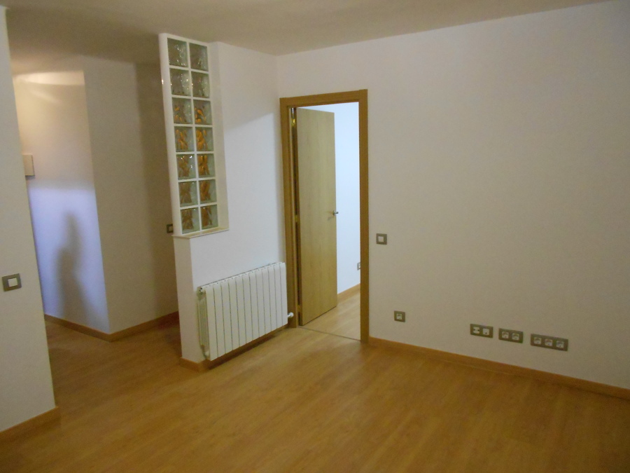 Salón distribuidor con columna de Pavés