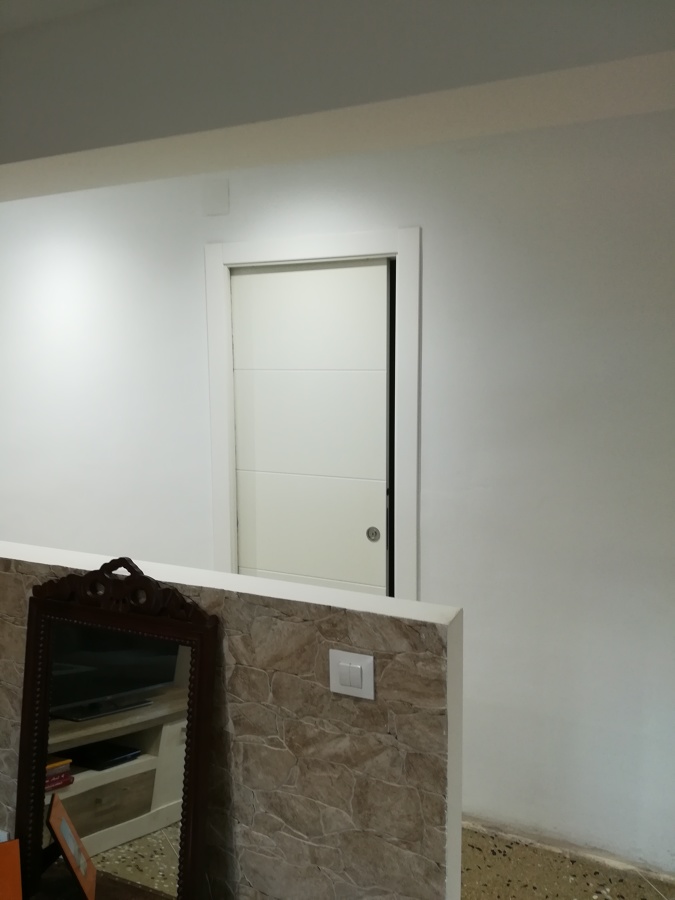 Separación comedor y puerta corredera empotrable