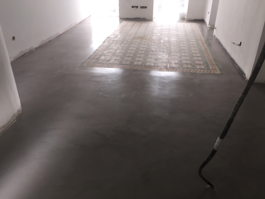 Suelo Salón con alfombra de hidráulico