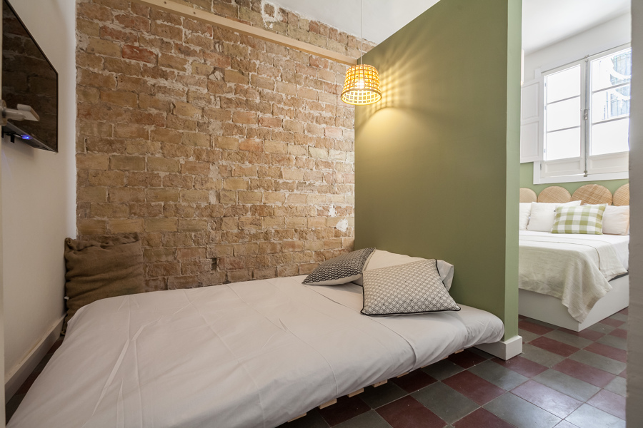 Suite con espacio de sofá cama independizado