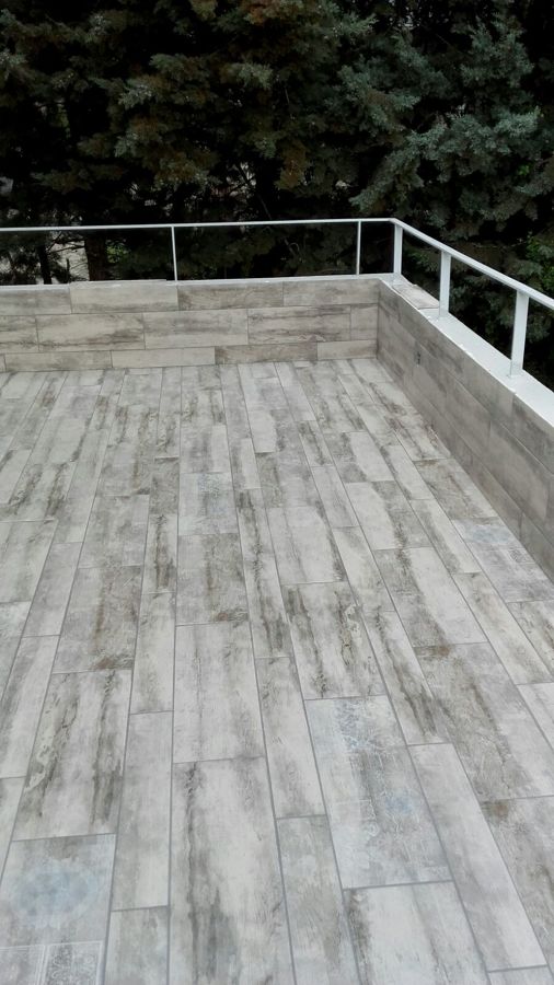 Terraza  y peto solado del mismo material