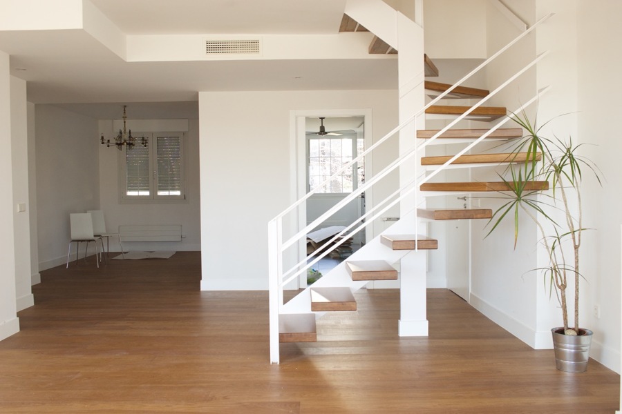 Transformación de escalera de caracol en escalera compensada