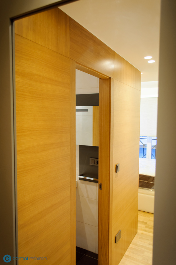 trasdosado de madera en dormitorio