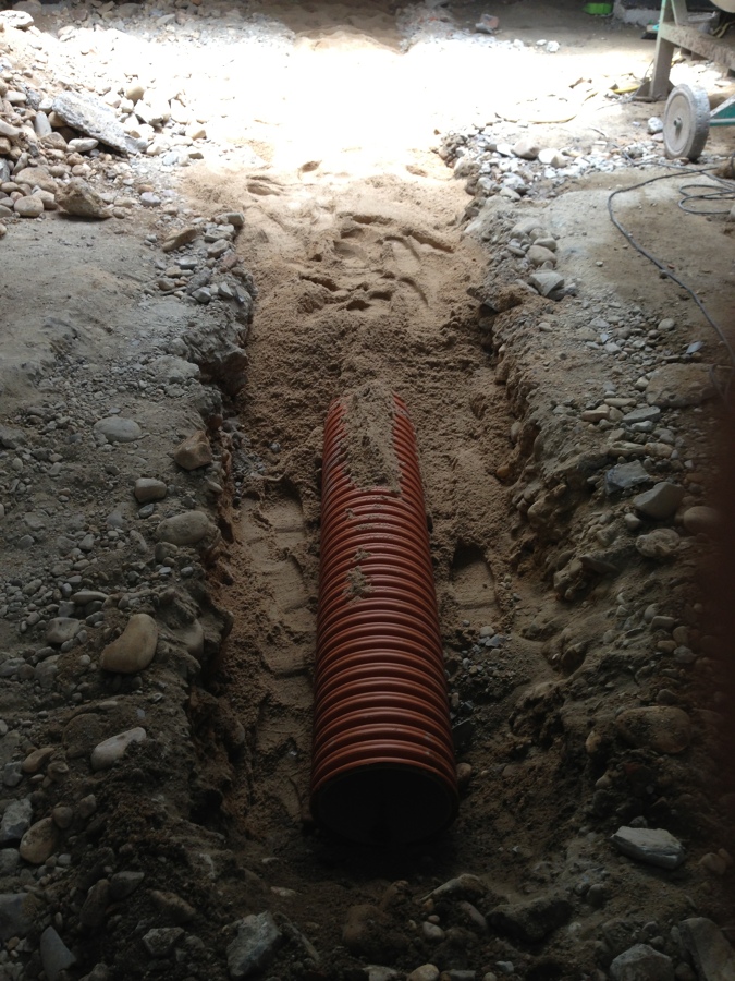 Tubo más relleno de arena de río