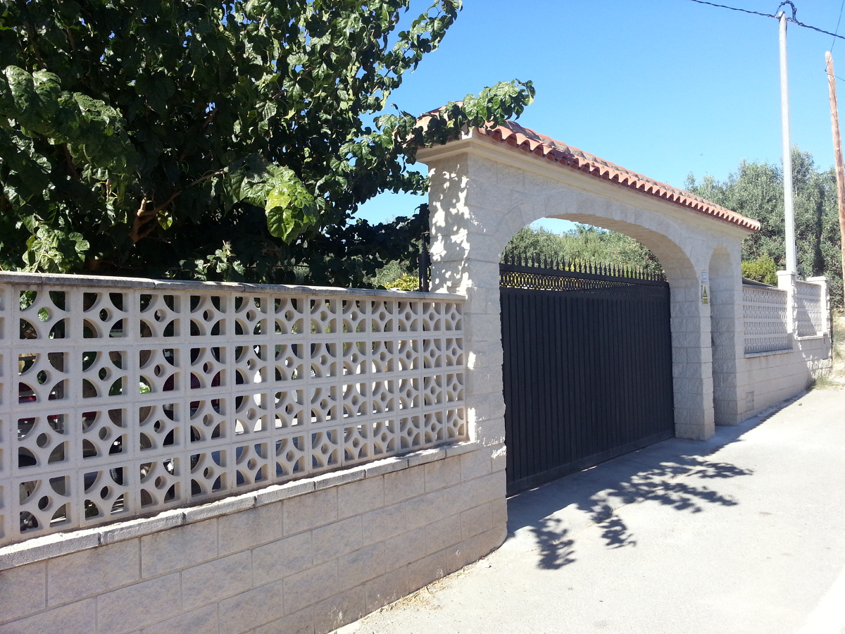 Valla de bloque con arco