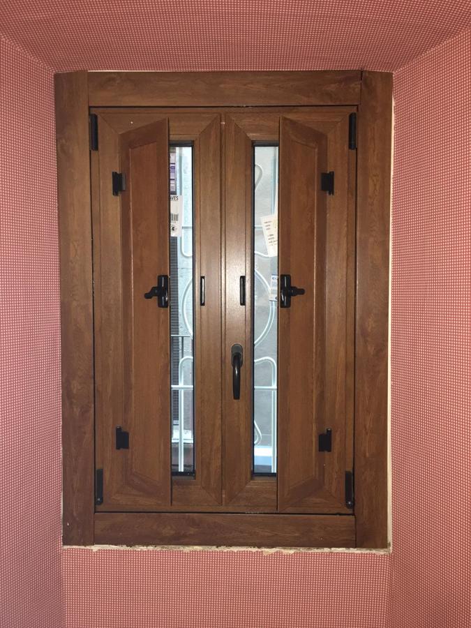 Ventana con porticones