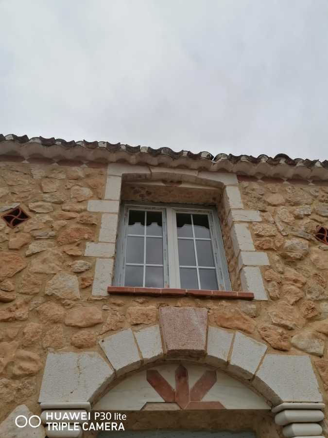 Ventana Komerling con barrotillo