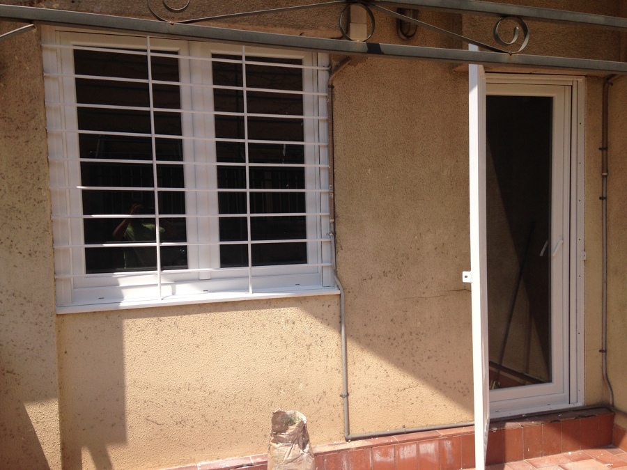 Ventana y puerta salón // FInestra i porta saló