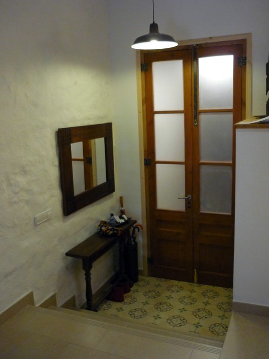 Vestíbulo de acceso, se utilizó el mosaico original recuperado