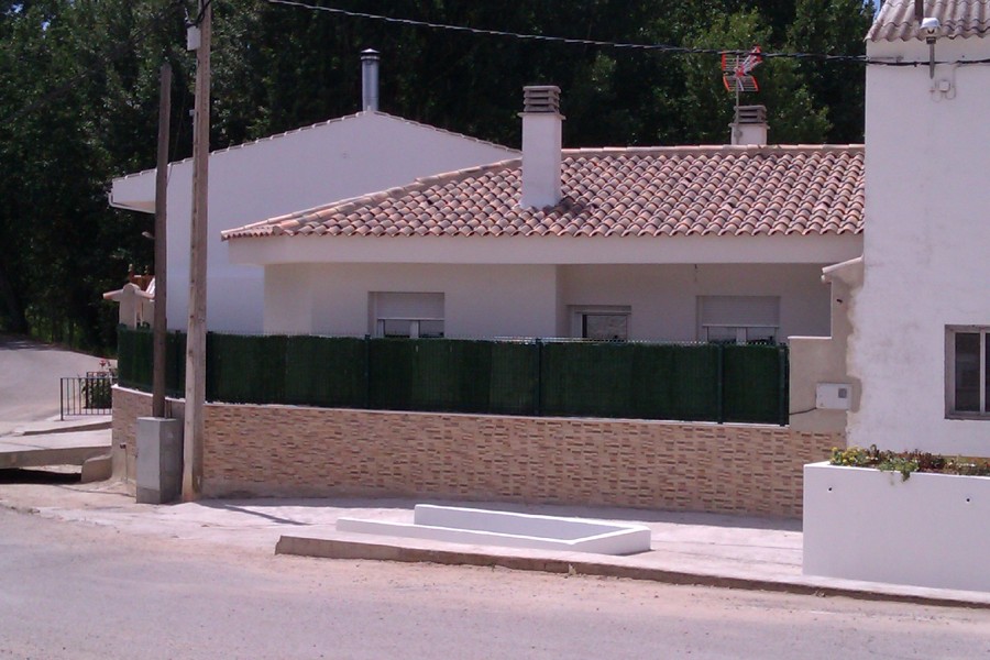 Vivienda unifamiliar en parcela de 800m2, estilo clásico.