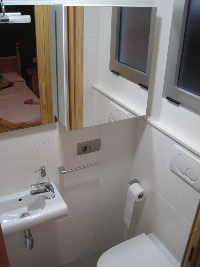 Wc con costerna empotrada