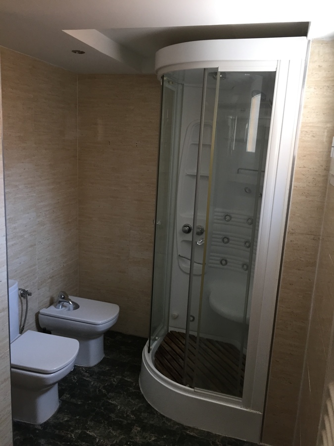 Zona de ducha en baño