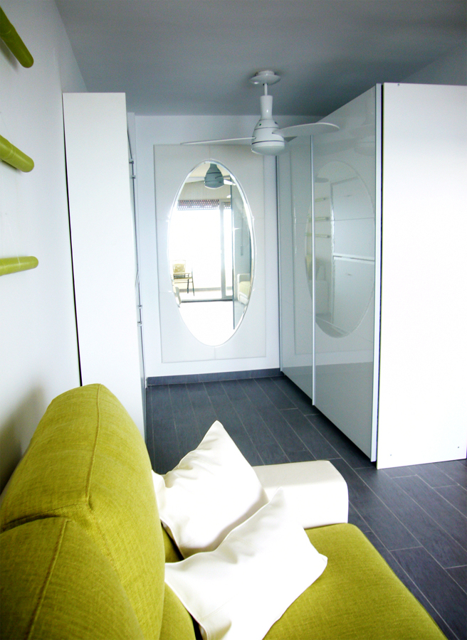 Zona de vestidor y camas literas