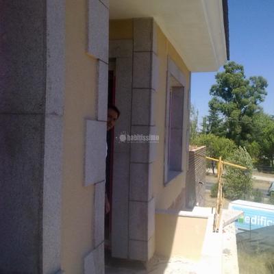 Revestimientos en monocapa raspado en chalet