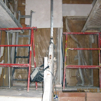 Ampliación buhardilla e instalación de escalera de madera,