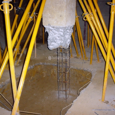 Restauración cimientos y zapatas bajo edificio construido