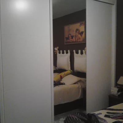 Armarios de puertas abatibles trasformados en corredera, Córdoba