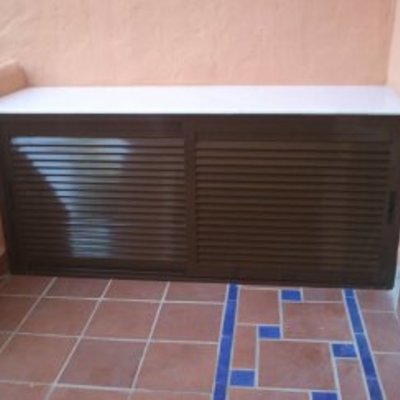 armario para cubrir maquina de aire acondicionado.