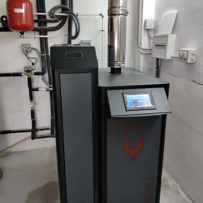 CALEFACCION Y AGUA CLIENTE CON CALDERA DE BIOMASA