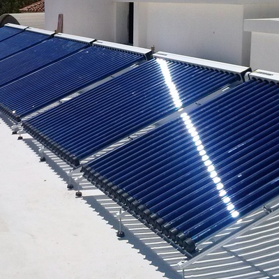 Instalación Solar Para Producción De Agua Caliente Sanitaria, Calefacción Y Calentamiento De Piscina