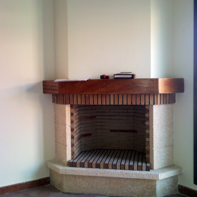 Chimenea rustica en chaflan