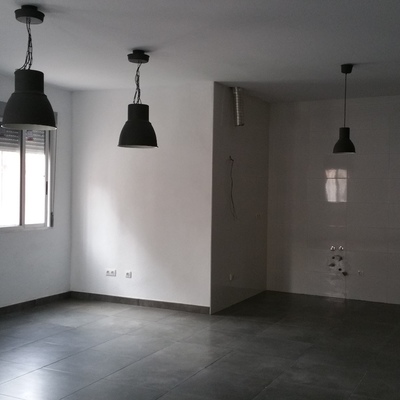 Ampliación de vivienda sobre almacén existente