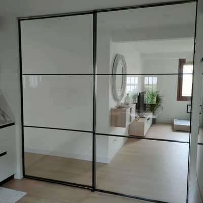 División acristalada vivienda