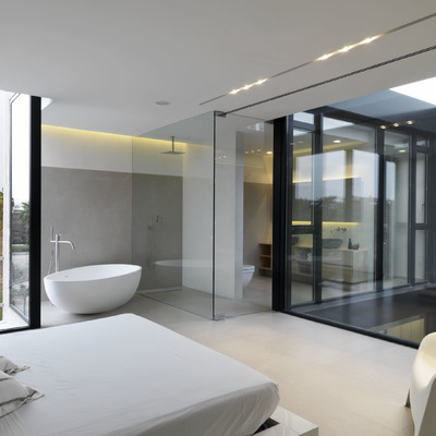 Dormitorio con baño