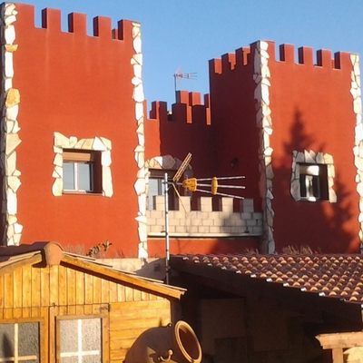 fachada piedra y monocapa