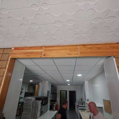 Cambio de fachada en entrada de pizzería