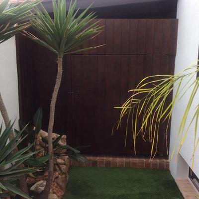 Forrado de puerta en madera y lavado manual