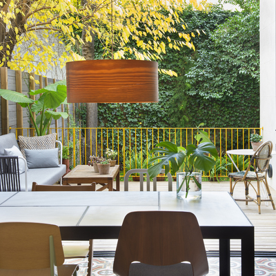Salón-comedor y jardín interior de manzana