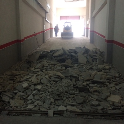 Demolición y ejecución de rampa en garaje 