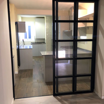 Mampara corredera acristalada de hierro 2