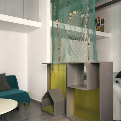 Mueble separador y zona vestidor con altillo