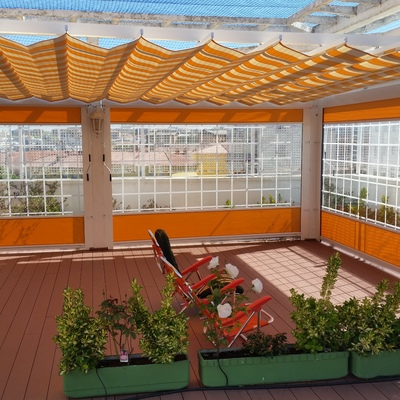 PERGOLA CON TOLDOS VERTICALES