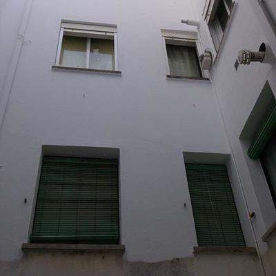 Pintura en patio de luz